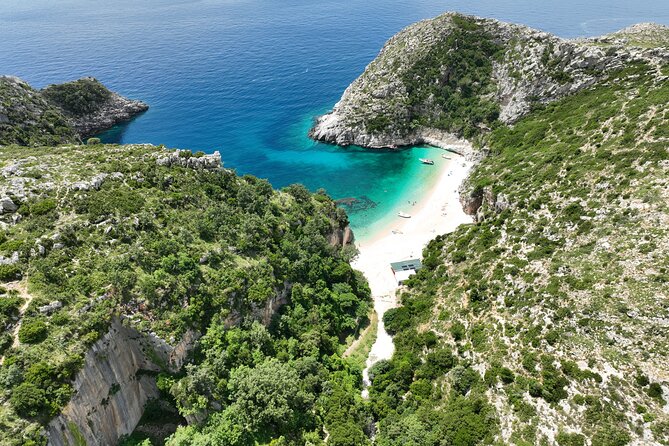 Blue Cave & Grama Bay Full Day Guided Boat Tour - Dafina Bay brings the first real beach break