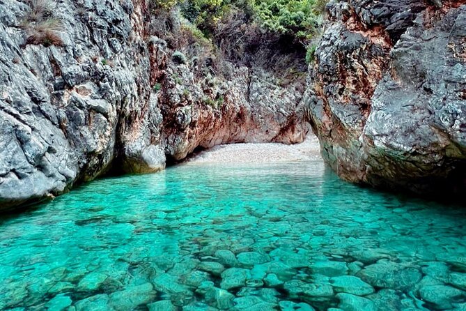 Boat trip to the National Park and Grama Bay - Dafina Bay and its blue-lit cave