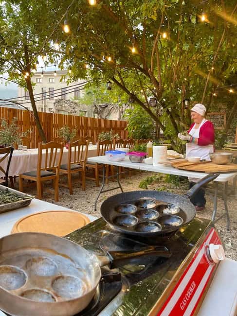 Cook Like a Local – Authentic Cooking Class in Gjirokastra - Preparing osa me mish qengji
