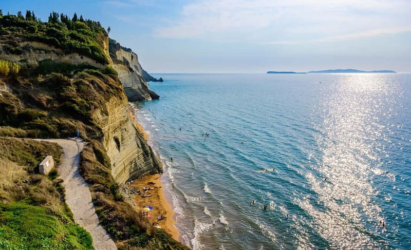 Corfu: Palaiokastritsa Swimming and Loggas Beach Sunset Tour - The road north and the sunset at Loggas Beach