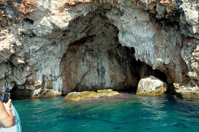 Dhermi: Boat tour of the coast to Filikuri beach - Pirates Cave, a short and atmospheric stop