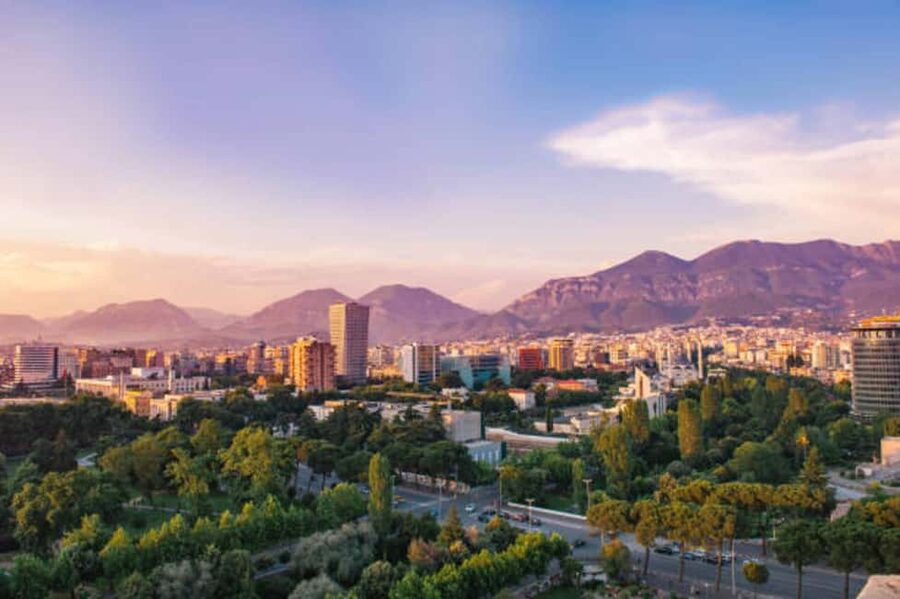 From Durres/Golem: Tirana City Tour and Dajt Cable Car - Walking through Skanderbeg Square