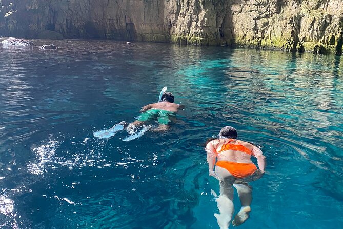 Private Full Day Boat Expedition to Grama Bay - Llovizi Bay and the Seal Monk Cave