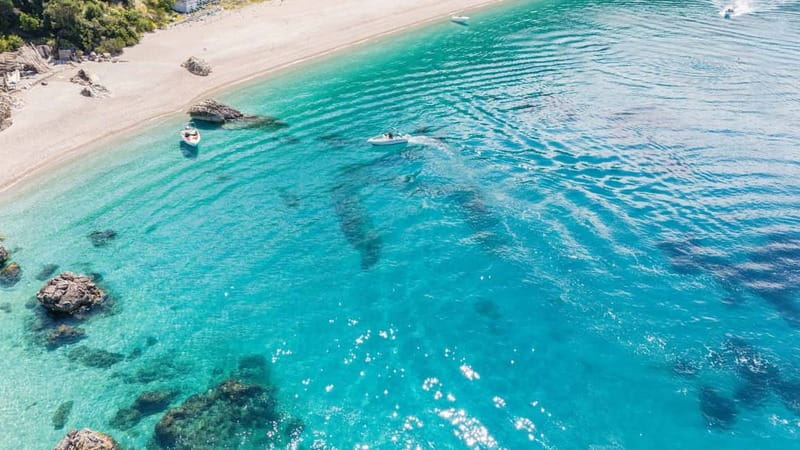 Saranda: Boat Tour to 7 Destinations with Beach Umbrella - Soldiers Bay and Pllakator: clear water and open-air fun