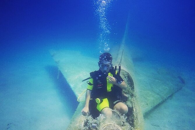 Scuba Diving in MIG-21 wreck - Who will enjoy this underwater visit most?