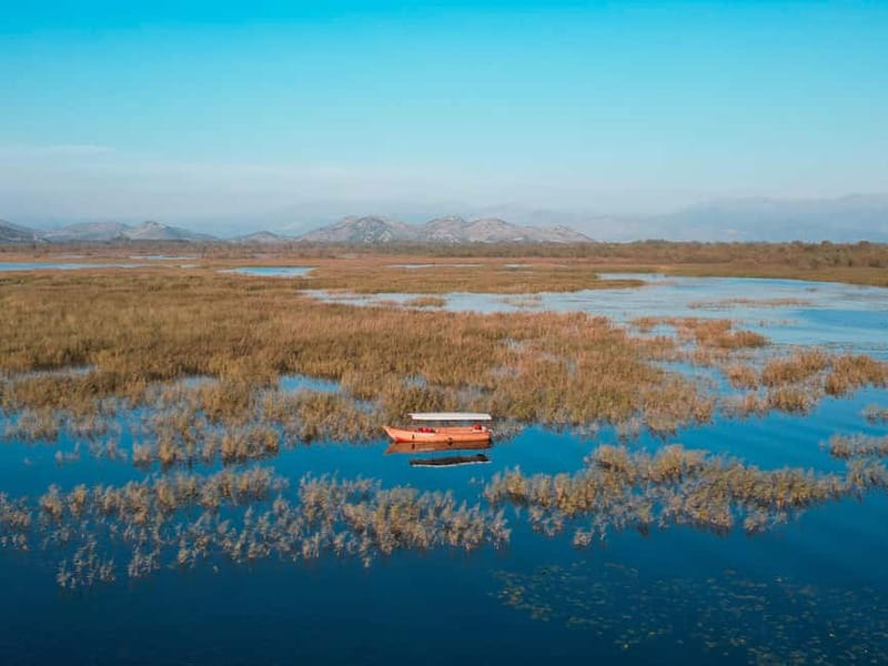 Skadar Lake National Park: Private Wooden Boat Tour & Wine - Kamenik adds wine and a useful pause