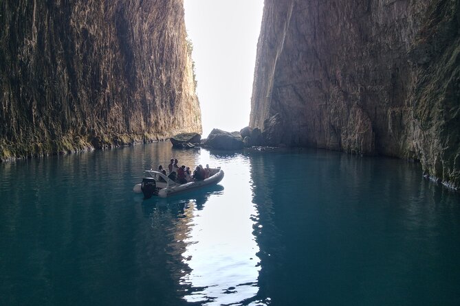 Snorkeling Experience Haxhi Aliu Cave & Ionian Cliffs - Hilqe Cliffs provide the final swim