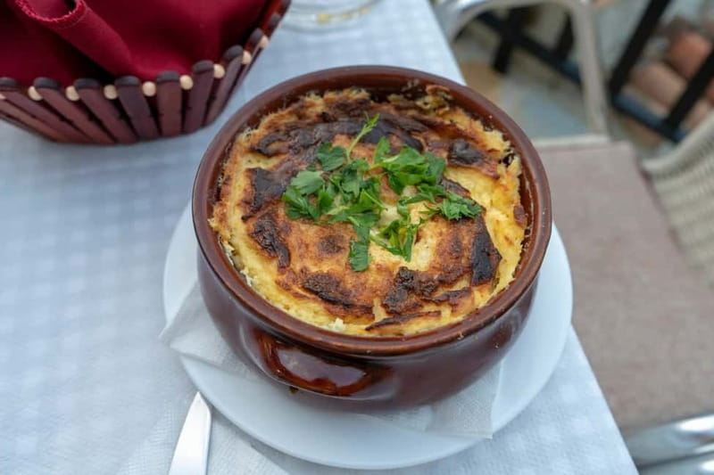 The secrets of Albanian cuisine: cooking lesson in Tirana - Preparing Tave Kosi, the independence dish