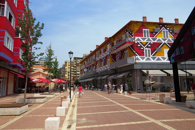 Tirana Bike Tour – Explore the City on Two Wheels - Crossing the Vodafone Bridge to Tirana Castle