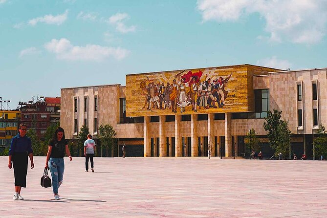 Tirana Express Walking Tour - Essential of the Albanian Capital - Komiteti Bar turns history into a coffee break