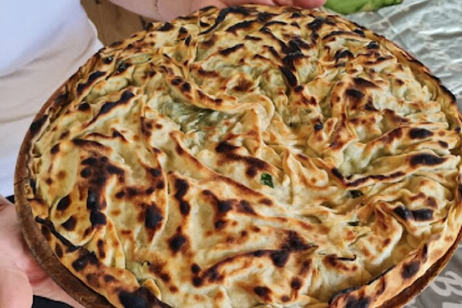 Tirana Guided Street Food Gems Tour (6 dishes, 1 sweet and drink) - The Pyramid brings the walk into modern Tirana