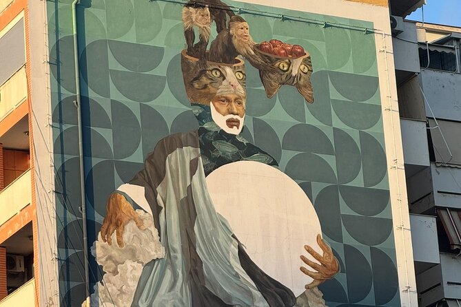 Tirana Mural Bike Tour: Street Art, Culture & Photography Stops - FAB Gallery and the upside-down bunker