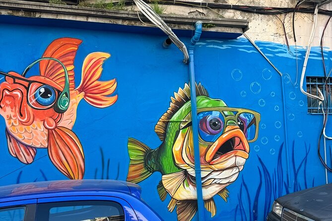Tirana Mural Bike Tour: Street Art, Culture & Photography Stops - Myslym Shyri’s abstract walls