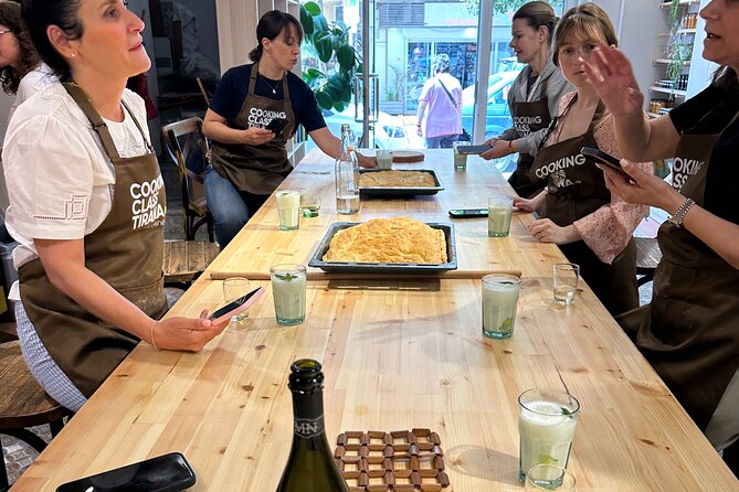 Traditional Albanian Cooking Class in Tirana with Raki Tasting - A communal meal that rewards an empty stomach