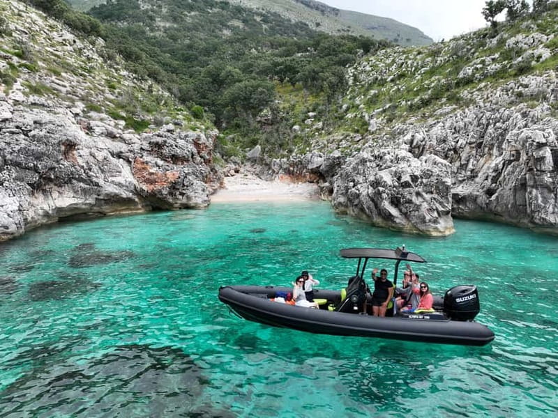 Vlore: Dafina Cave & Haxhi Ali Cave Speedboat Guided Tour - Bristan Bay and the concrete remains of communism