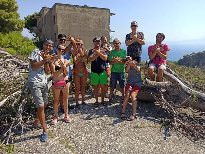 Vlore Guided Tour: Sazan Island, Haxhi Ali Cave & Karaburun - Sazan Island: military remains beside clear water