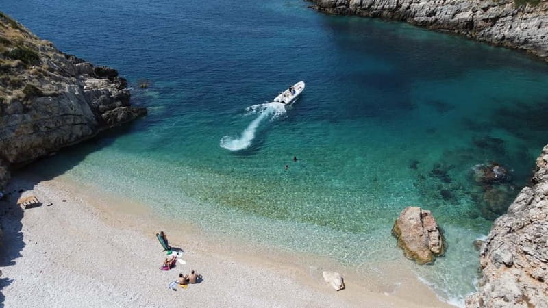 Vlore: Haxhi Ali Cave and Dafina Cave Speedboat Tour - Brsitan Bay adds a quiet inland walk