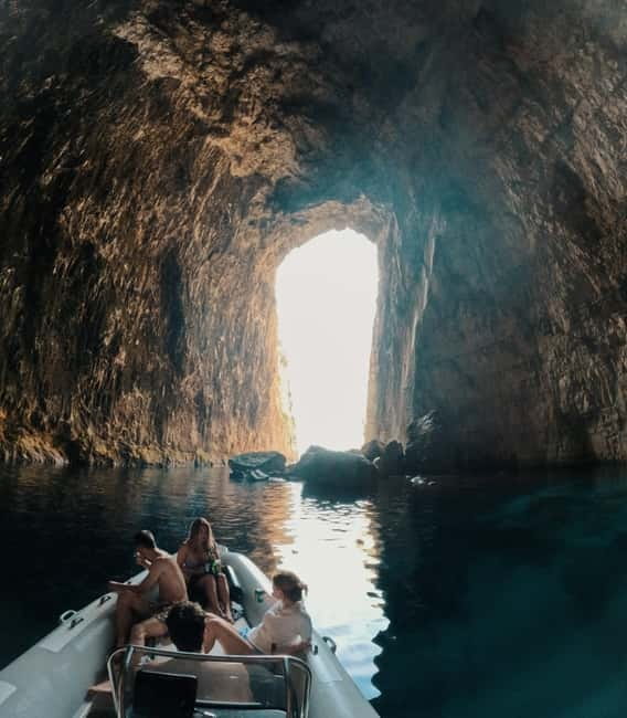 Vlore: Sazan Island,Haxhi Ali Cave & Karaburun Boat Tour - Sazan Island: military ruins beside the sea